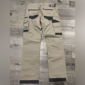 FXD work pants. Tan color dark grey and neon green. Size 32 waist